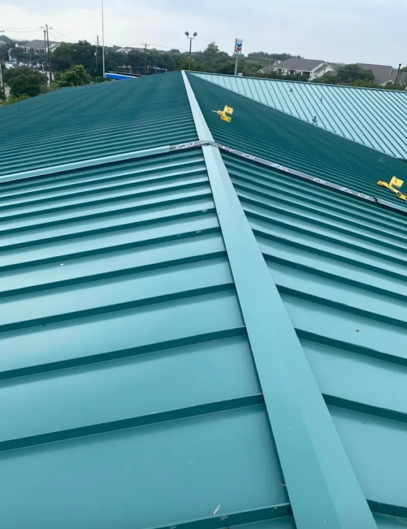 Green commercial metal roof ridge and valley for Metal Roof Repair in Wildewood